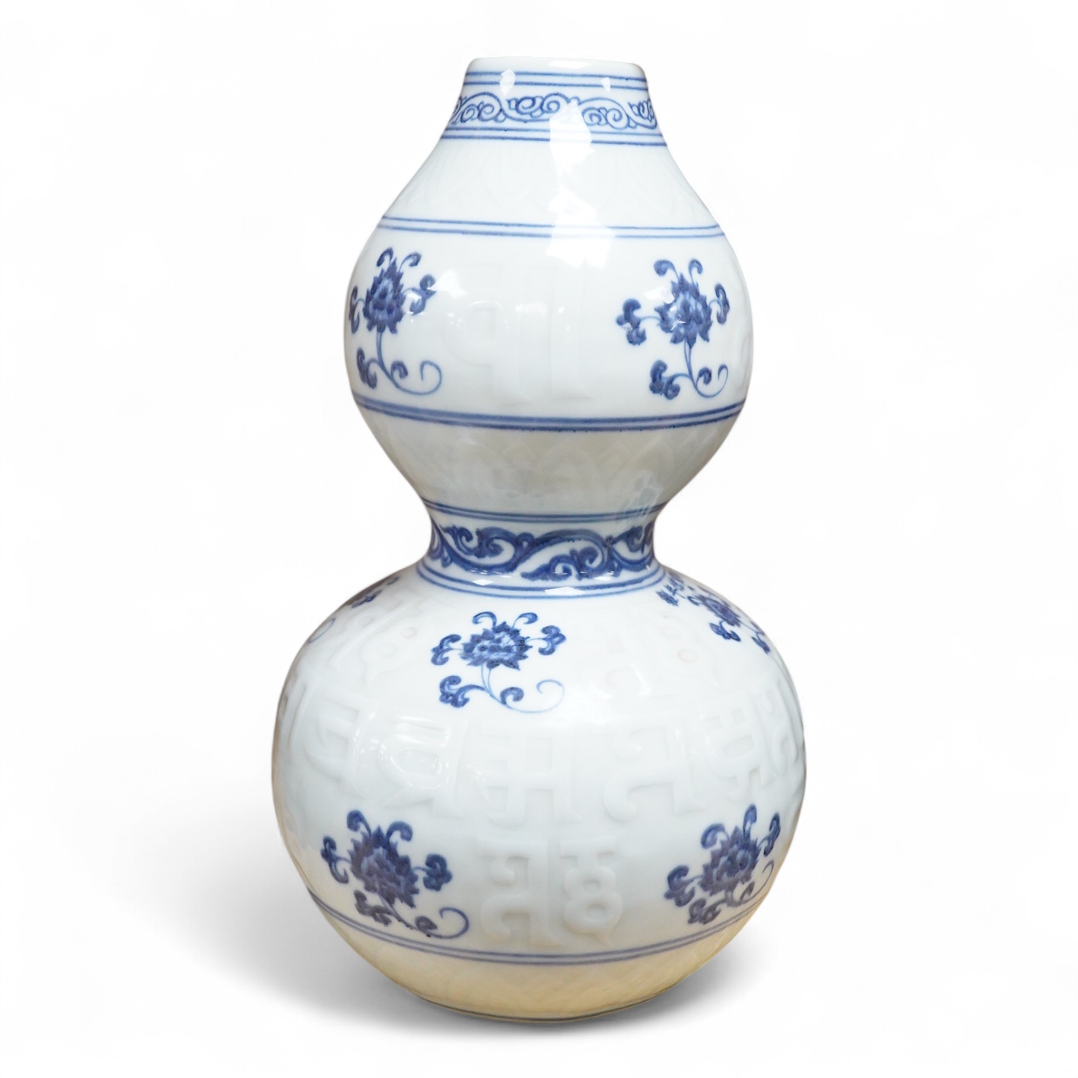 A Chinese blue and white double gourd vase, 30cm